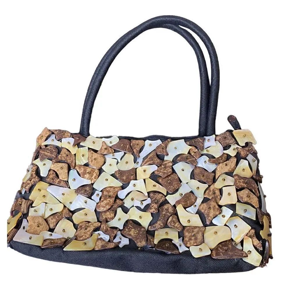 Mother of pearl shell encrusted black bag